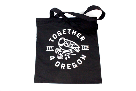 6oz black canvas with hand screen printed white design in partnership with Together 4 Oregon